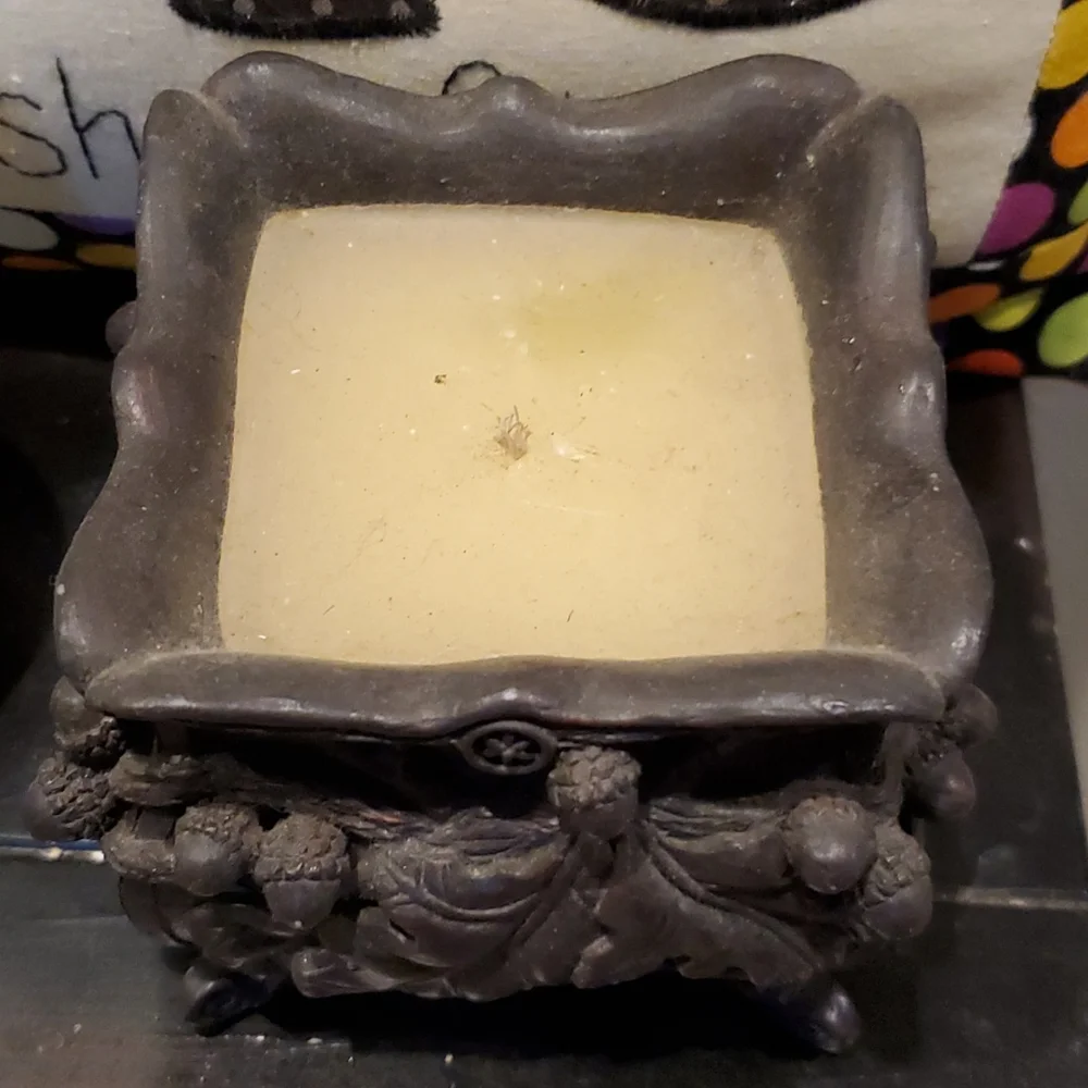 NEW Resin candle holder and candle. Heavy piece